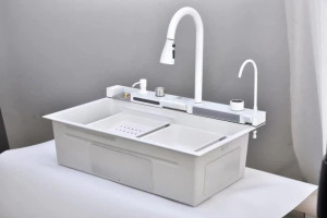 Multifunctional, white stainless steelworkstation kitchen sink featuring a digital temperature display