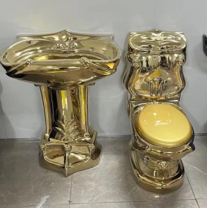 gold-plated pedestal basin and toilet set Is a modern design product featuring a ceramic construction with a polished golden finish