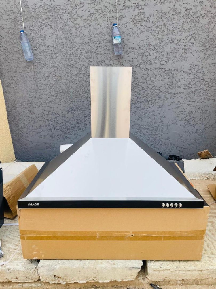 a wall-mounted Kitchen appliance desinged for removing smoke and odors