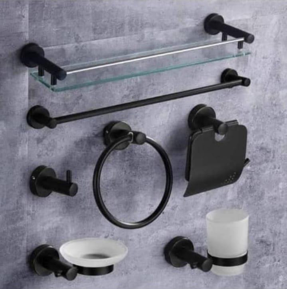 The black stainless steel bathroom accessories set includes a towel rail, glass shelf, toilet roll holder, towel ring, soap dish, toothbrush holder, and robe hook