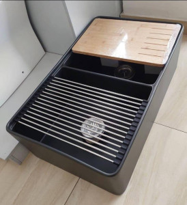 Black coloured Apron-front sink