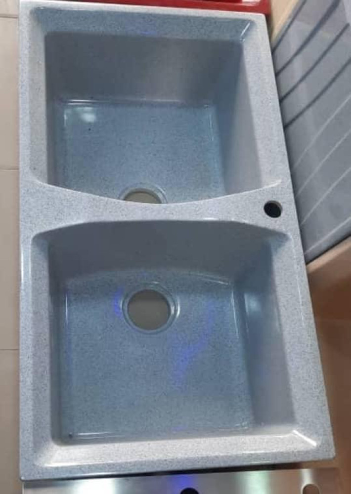 Gray Composite granite Kitchen sink faturing two bowls and pre-drilled faucet hole