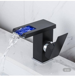 matte black LED waterfall bathroom faucet that features a colour changing LED ligh that illuminates the water flow