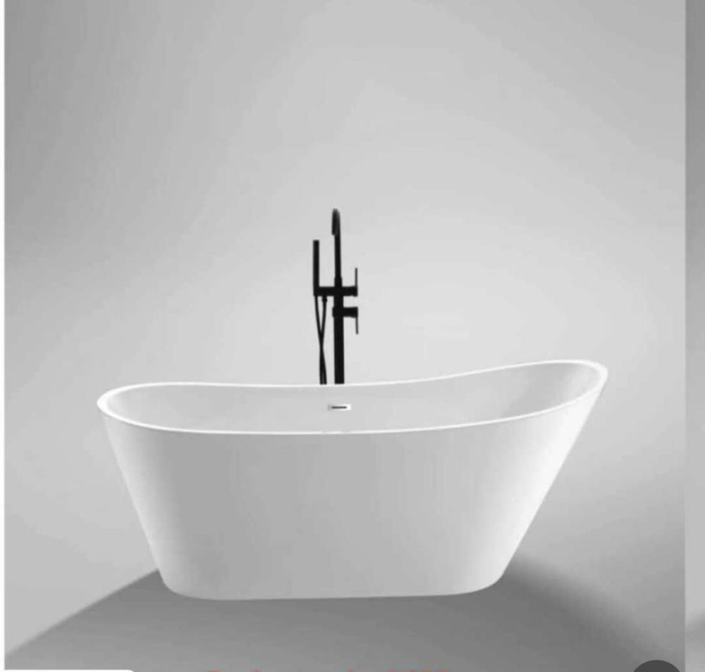 Curved edge luxury freestanding bath designed to add elegance and comfort to a modern bathroom