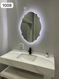 modern rectangular-shaped LED bathroom mirror, often described as a wavy, cloud or flower-shaped illuminated wall mirror