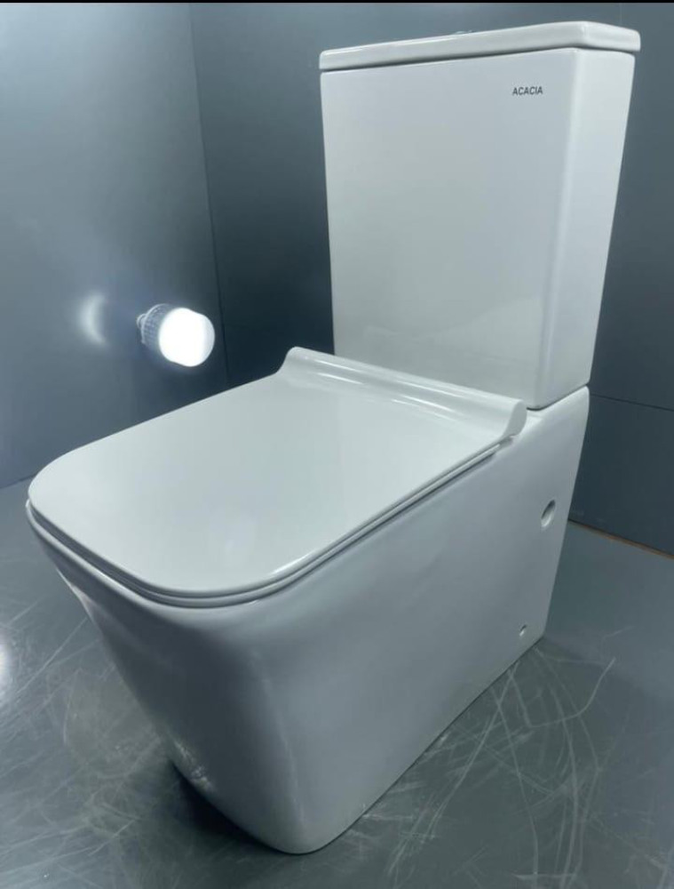 Acacia toilet is a modern, one-piece water closet designed for a sleeek, contemporary bathroom asthetic