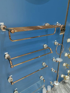Rose gold bathroom towel shelf is simialr to the Allied Brass Carolina Collection model featuring crystal accents